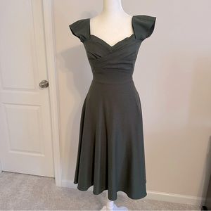 Stop Staring! Swing Dress in Olive Houndstooth